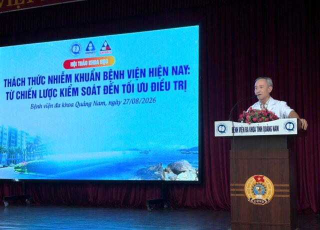 Conference speaker at podium
